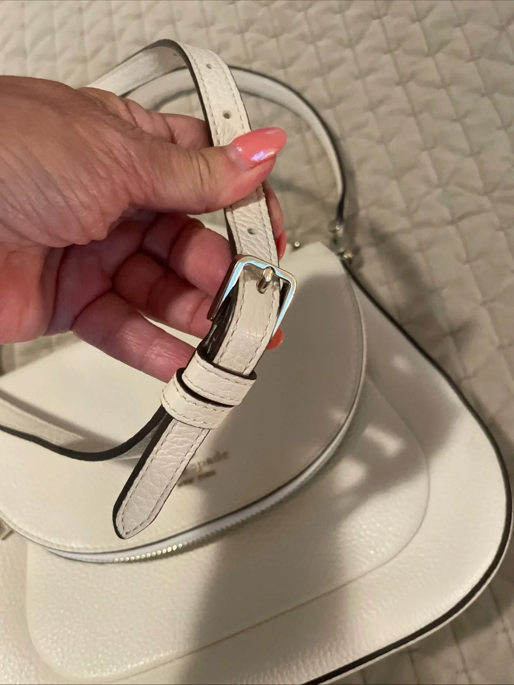 kate spade cream pebbled leather crossbody with gold logo